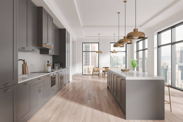 istock Home kitchen interior with eating table and cooking cabinet. Panoramic window 2185252680