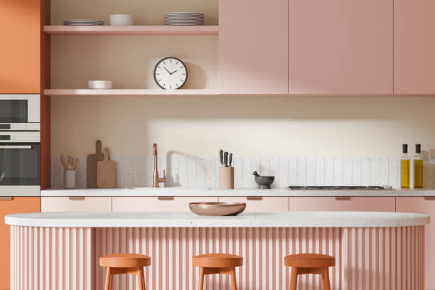 istock Modern kitchen interior featuring pink cabinetry and stylish decor. 3D Rendering 2185252704