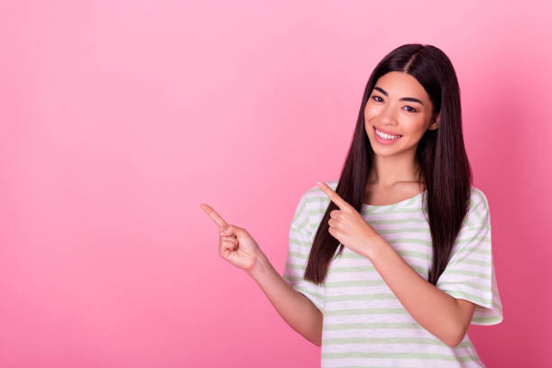 istock Photo of positive lady point finger empty space indicate promotion object empty space isolated pastel color background 2185253450