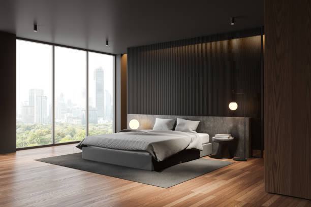 istock Dark hotel bedroom interior with bed and decoration, panoramic window 2185254803