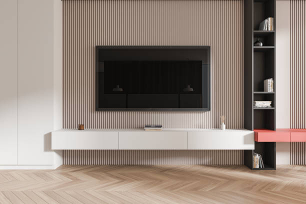 istock Living room interior with tv console, shelf with art decoration and screen 2185254822