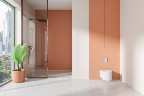 istock Bright hotel bathroom interior with glass shower and toilet, panoramic window 2185254943