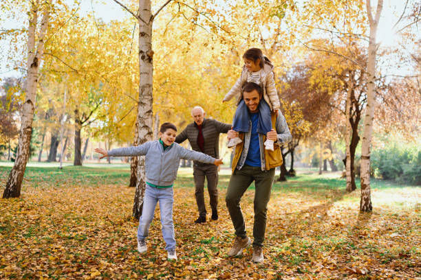 istock Multigenerational Family playing Airplane running game 2185256681