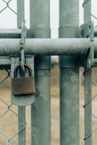 istock Padlocks closed on metal doors. 2185257742