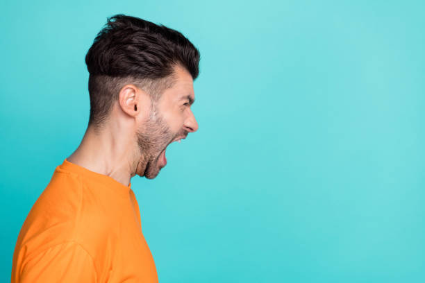 istock Side profile photo of young funny impressed unhappy agressive bearded guy look empty space boss scream no isolated on aquamarine color background 2185257830