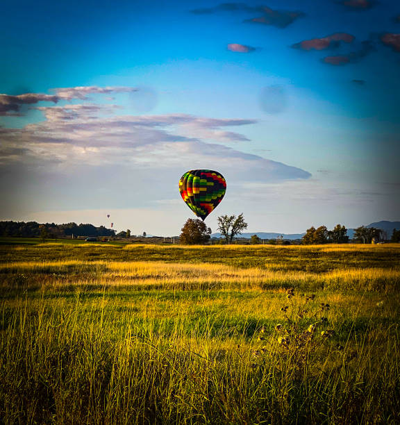 istock Hot air balloon landing 2185263216