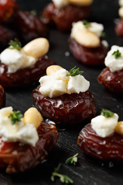 istock Stuffed Medjool dates with goat cheese, almonds and honey 2185263652