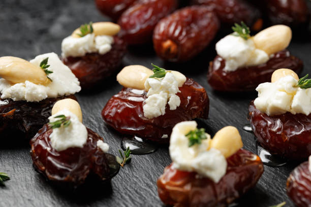 istock Stuffed Medjool dates with goat cheese, almonds and honey 2185263678
