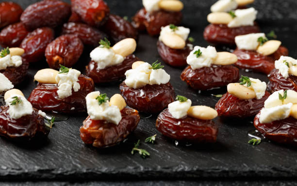 istock Stuffed Medjool dates with goat cheese, almonds and honey 2185263681