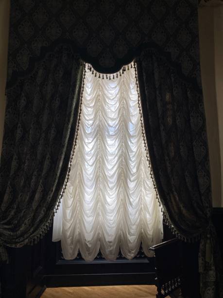 istock luxury black curtain with curtains 2185265925