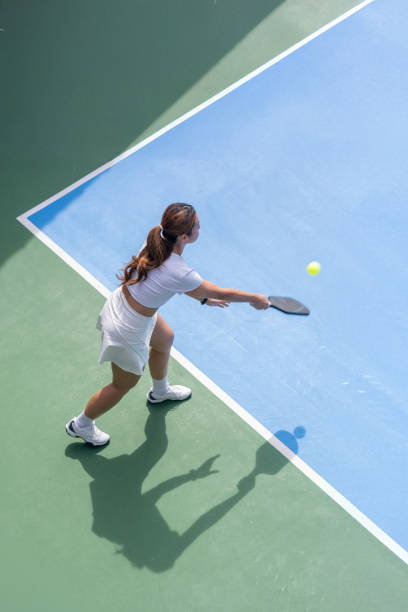 istock Game in Motion: A Pickleball Player's Outdoor Serve 2185268211