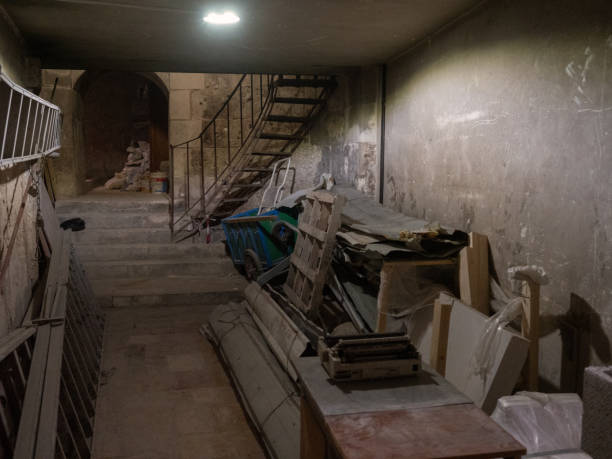 Warehouse with ice cream buckets wrapped in foil without people