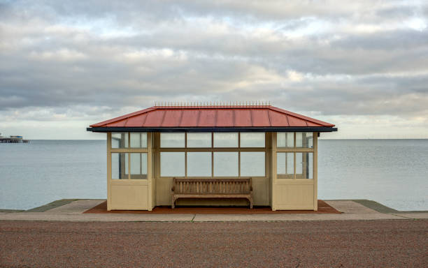 View of a promenade shelter on Llandudno promenade, UK.