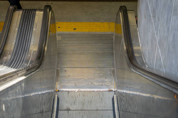 Automatic stairs leading to the tunnel at the railway station