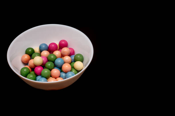 Heap of chewing gum pieces on white background