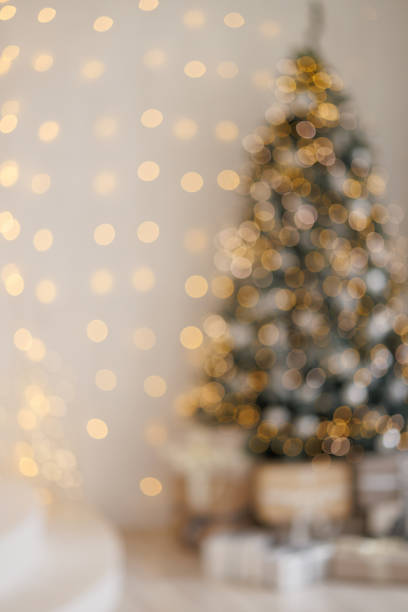 istock A blurry Christmas scene with a fireplace and two trees 2185271557