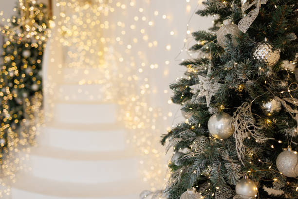 istock A white staircase leading up to a white Christmas tree 2185273798