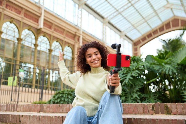 Influencer creating content for social media in a greenhouse
