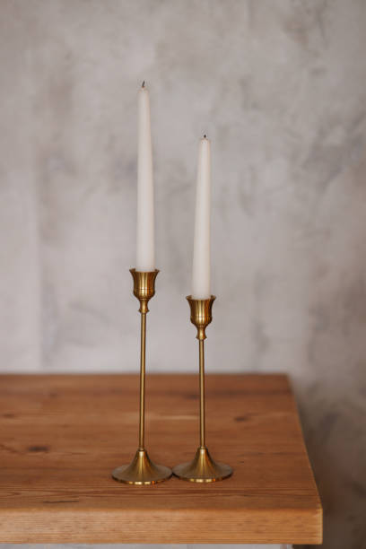 istock Two Candles Wooden Table Candle Holder 2185274449
