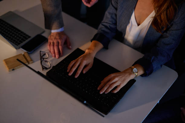 istock Diverse Team Collaborates on Project with Laptop in Office 2185274680