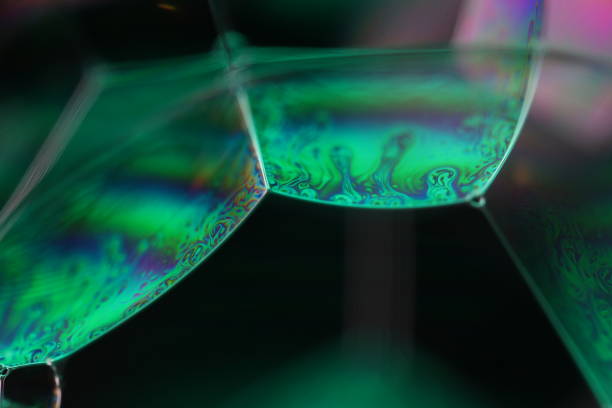 istock Cold green liquid phenomenal surface, green oils on the dark background 2185282334