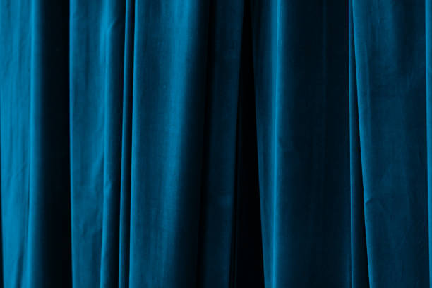 istock Blue curtain in theatre background 2185283848