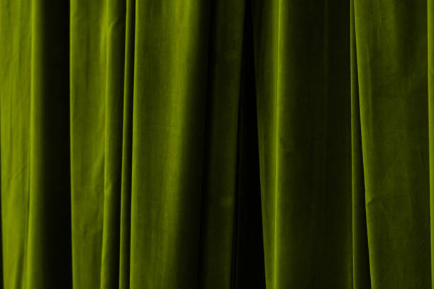 istock Green  curtain in theatre background 2185283941