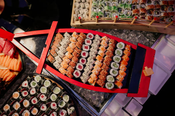 Vibrant Sushi Platter on a Decorative Boat. stock photo