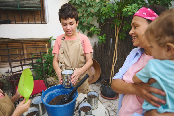 istock Family bonding through gardening in a backyard setting 2185285015