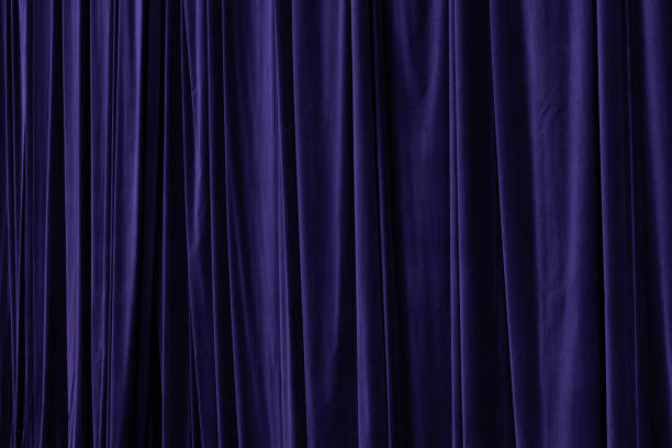 istock Violet curtain in theatre background 2185285094