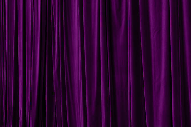 istock Purple curtain in theatre background 2185285117
