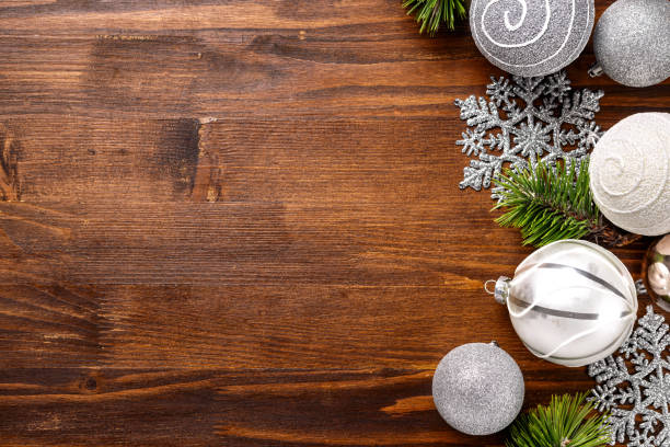 istock Elegant Christmas Ornaments on Wooden Background 2185287199