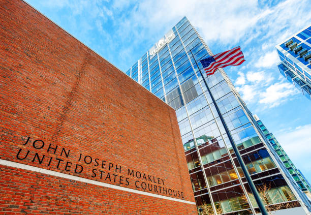 Boston, Massachusetts, USA - November 16, 2024: The John Joseph Moakley United States Courthouse is a federal courthouse for the United States Court of Appeals for the First Circuit and the United States District Court for the District of Massachusetts, located on Fan Pier on the Boston  waterfront. Named after Congressman Joe Moakley, the building was completed in 1999 and has won many design awards.