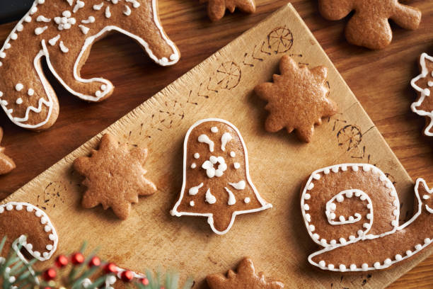 istock Bell shaped homemade gingerbread Christmas cookie decorated with white icing 2185288190