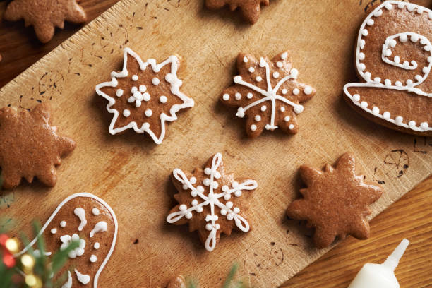 istock Star shaped homemade gingerbread Christmas cookies decorated with white icing 2185288192