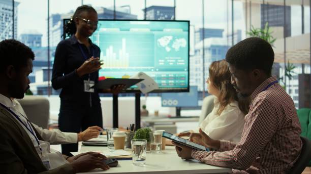 istock Diverse group of colleagues working together on allocating resources 2185295834