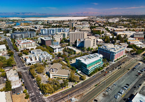 Aerial of Redwood City, California, with the lower San Francisco Bay and the Diablo Range in the background.  Redwood City is part of the San Francisco Peninsula in the San Francisco Bay Area.