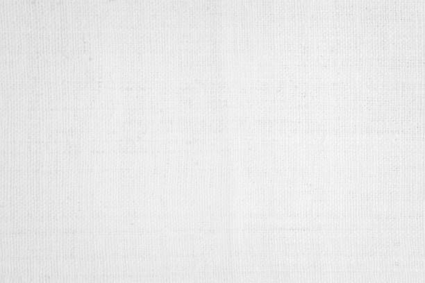 istock White color fabric canvas woven texture background in pattern light blank. Natural gauze linen, carpet wool and cotton cloth textile textured as clean empty for decoration text. Grey sack material. 2185301360