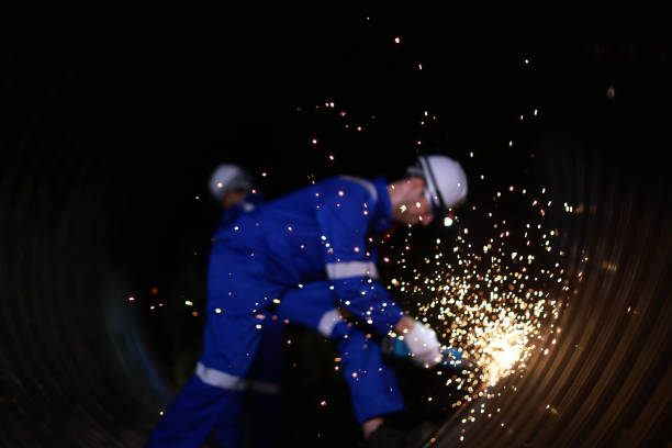 Blurly scene Senior engineer and site engineer work grinding in construction tunnel