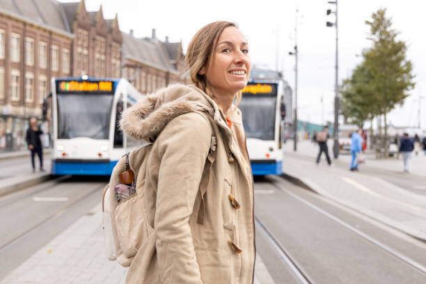 istock Woman Waiting for Trams at a City Stop 2185313571