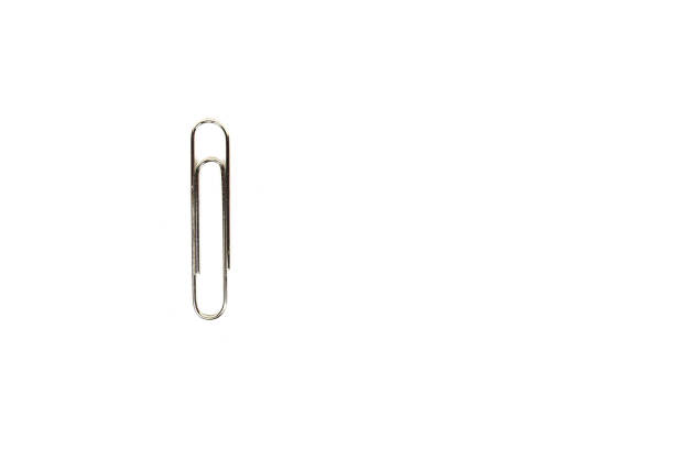 istock single silver paperclip in vertical position on a white background 2185320659