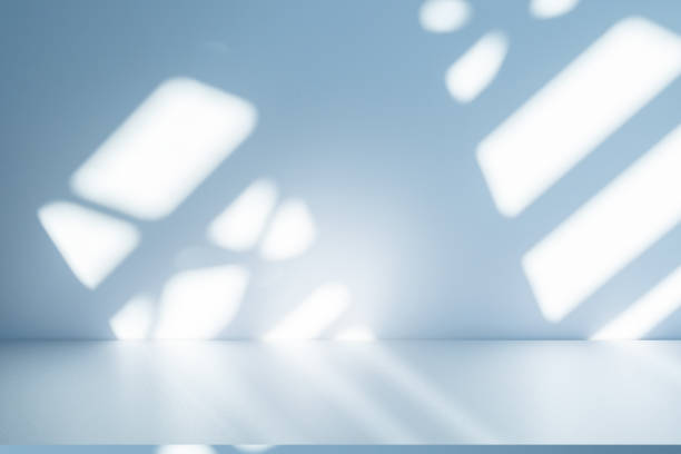istock Studio style background wall decoration presentation uses white and blue tones. with shadows cast from a nearby window, concept creating a decorative 2185329166