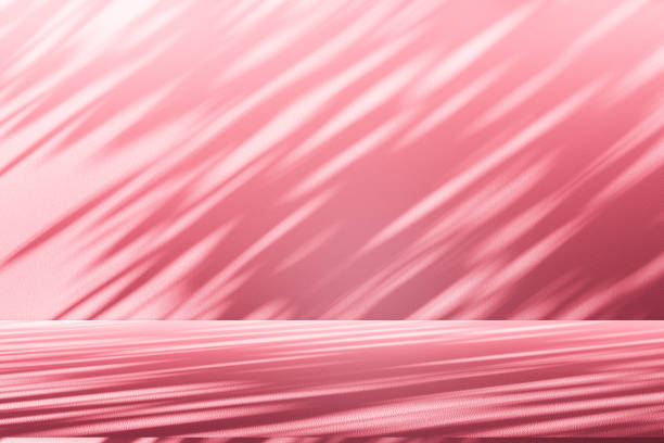 istock Wall interior background, studio, and backdrops show products. with shadow from window color white and pink light. background for text insertion and presentation of product 2185329171