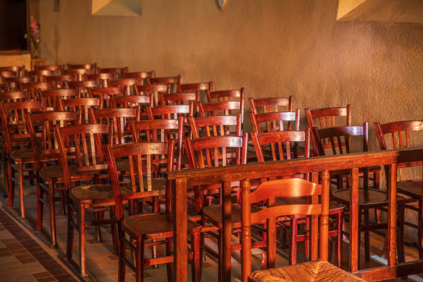 istock Rows of wooden chairs 2185330808