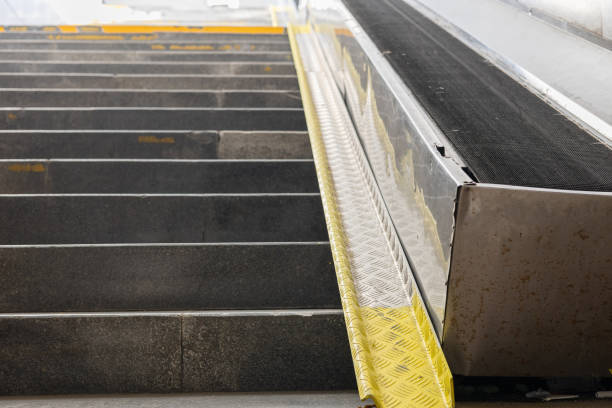 istock Metal railing for bicycles installed too close to the elevator, preventing normal operation. User experience fail, poor execution of a good bicycle ramp 2185339745