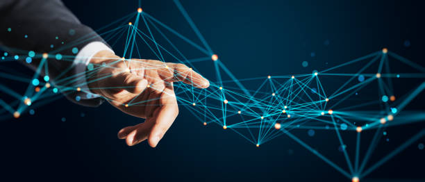 istock Hand of a person interacting with a digital network of interconnected points and lines, set against a dark blue background, concept of technology. 2185341005