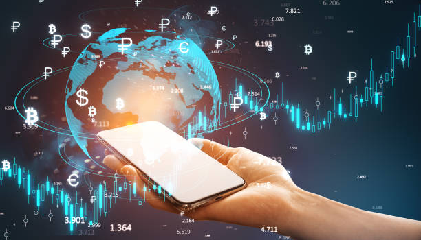 istock Digital Currency Exchange on Mobile Device with Global Financial Symbols and Data. 2185341076