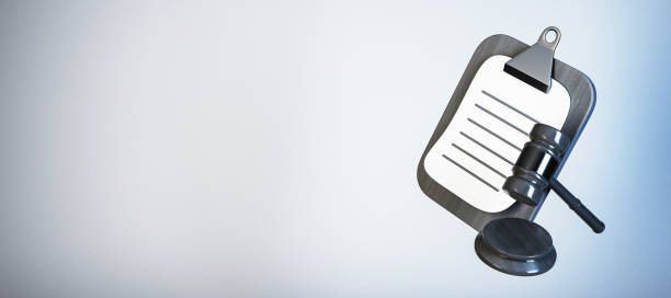 istock Gavel and clipboard symbolizing judgment and decision-making, isolated on a soft gradient background. 3D Rendering 2185341169