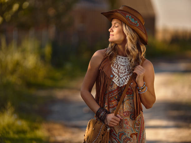 istock Smiling female rancher enjoying in nature. 2185344317