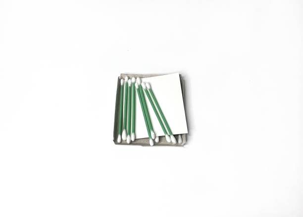 istock cotton bud for cleaning wax in the ear on a white background 2185344362